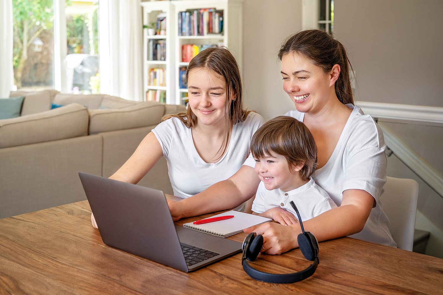 Family on a laptop for online counseling