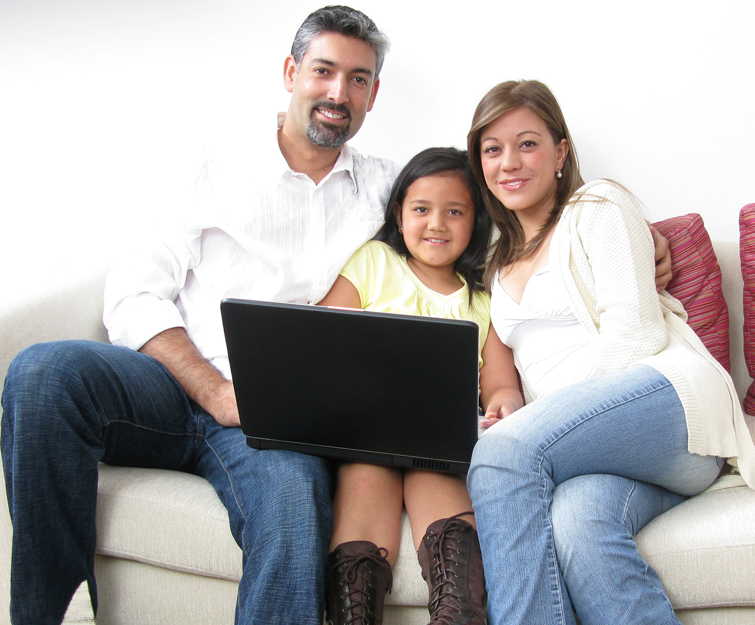 Parents with daughter on couch for online counseling