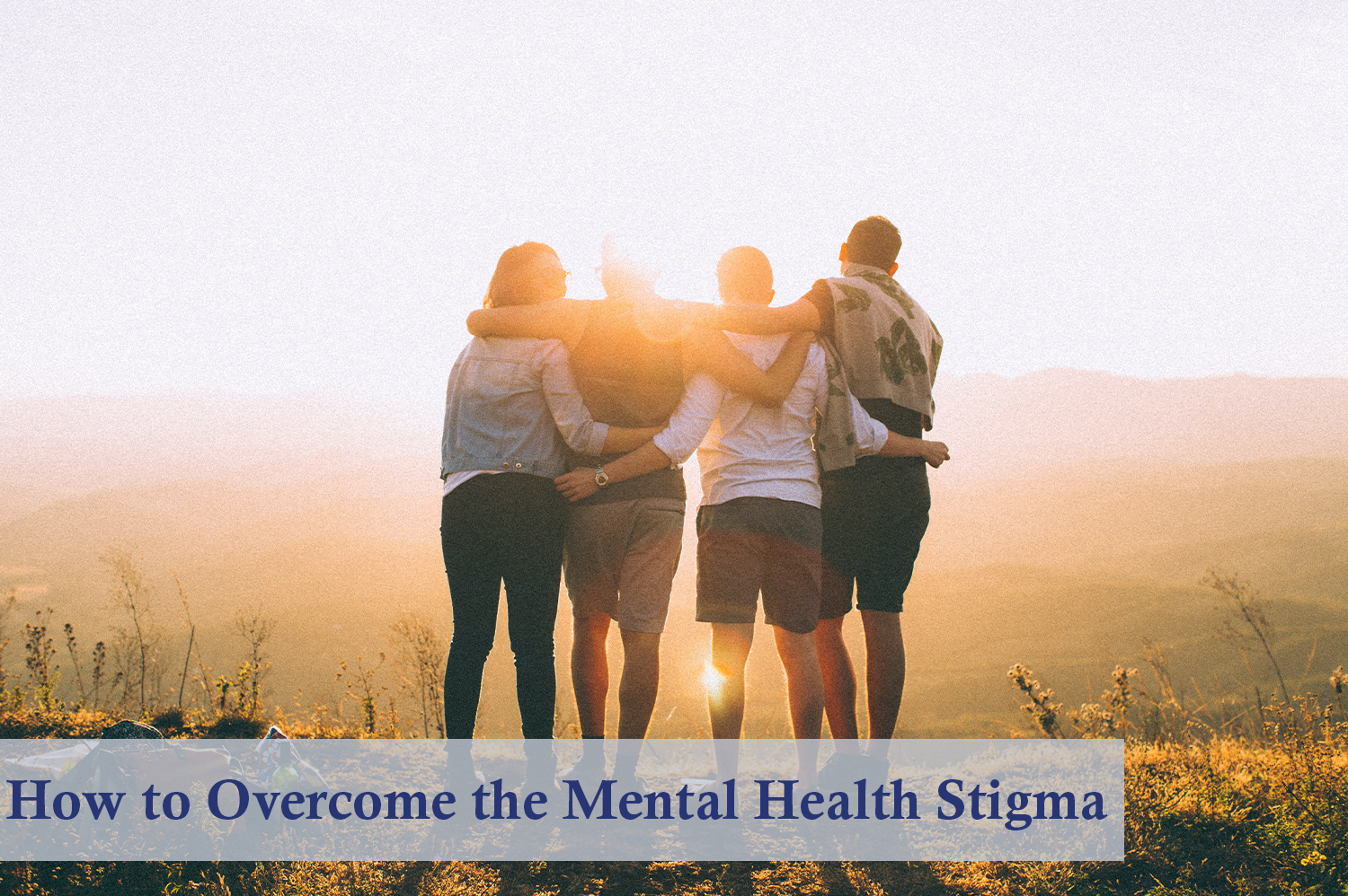 Friends at looking at a sunset, supporting each other to defeat the mental health stigma.